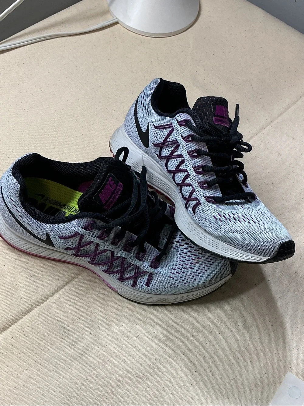 Nike Women's running Shoes in Light Blue with Purple Accents